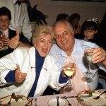 
              FILE - Los Angeles Dodgers manager Tommy LaSorda and his wife, Jo, give the thumbs up sign and a toast at a gathering of friends and associates to celebrate winning the 1988 World Series the day before at a Los Angeles restaurant, in this Friday, Oct. 21, 1988. file photo. Jo Lasorda has died. She was 91. She died Monday night, Sept. 20, 2021, at her home in Fullerton, the team said Tuesday. No cause of death was given. (AP Photo/Reed Saxon, File)
            