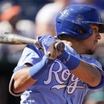 
              Kansas City Royals' Nicky Lopez hits an RBI single during the sixth inning of a baseball against the Seattle Mariners game Sunday, Sept. 19, 2021, in Kansas City, Mo. (AP Photo/Charlie Riedel)
            