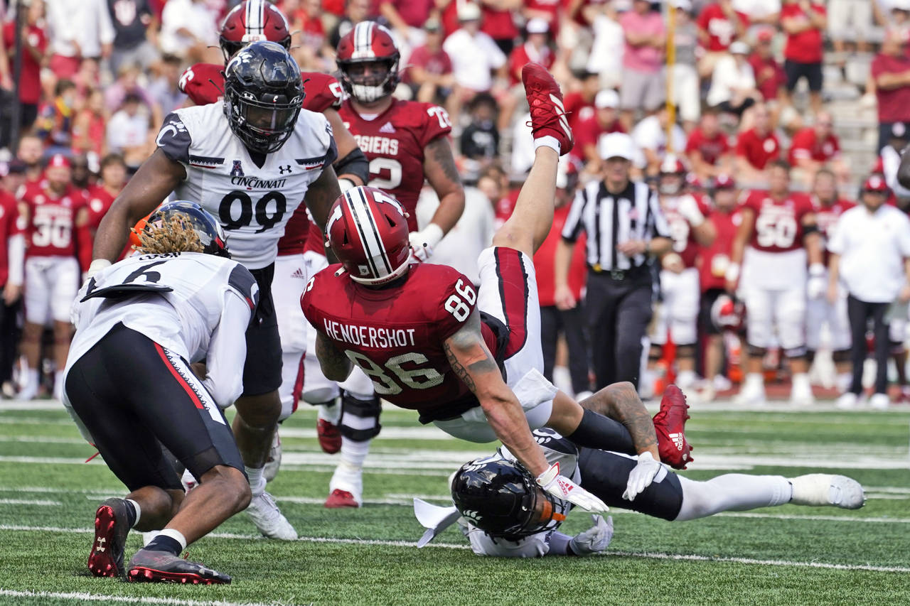 Ridder helps Bearcats rally for 38-24 win at Indiana