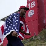 
              Team USA's Tony Finau celebrates after the Ryder Cup matches at the Whistling Straits Golf Course Sunday, Sept. 26, 2021, in Sheboygan, Wis. (AP Photo/Ashley Landis)
            