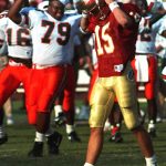 
              FILE - In this Nov. 16, 1991, file photo, Miami's Jesse Mitchell (79) exults as dejected Florida State kicker Gerry Thomas (15) walks off the field after missing a field goal that would have won the game for FSU in Tallahassee, Fla. The game was the first 1-2 matchup between two teams in the same state since Purdue and Notre Dame did in 1968, and it marked a shift in the landscape of college football to the Sunshine State. (AP Photo/Don Dughi, File)
            