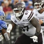 
              Mississippi State offensive lineman Charles Cross (67) blocks during the first half of an NCAA college football game against Memphis, Saturday, Sept. 18, 2021, in Memphis, Tenn. (AP Photo/John Amis)
            