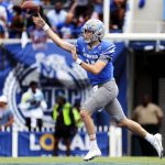 
              Memphis quarterback Seth Henigan (14) rolls out of the pocket to complete a pass against Mississippi State during an NCAA college football game Saturday, Sept. 18, 2021, in Memphis, Tenn. (Patrick Lantrip/Daily Memphian via AP)
            