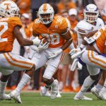 
              Tennessee linebacker Solon Page III (38) returns an interception during the second half of an NCAA college football game against Tennessee Tech, Saturday, Sept. 18, 2021, in Knoxville, Tenn. Tennessee won 56-0. (AP Photo/Wade Payne)
            