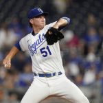 
              Kansas City Royals starting pitcher Brady Singer throws during the first inning of a baseball game against the Cleveland Indians Tuesday, Sept. 28, 2021, in Kansas City, Mo. (AP Photo/Charlie Riedel)
            