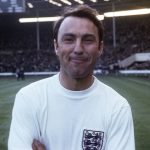 
              FILE  - In this 1967 file photo, England football forward Jimmy Greaves stands on the pitch at Wembley, England, prior to an international soccer match. Jimmy Greaves, one of England’s greatest goal-scorers who was prolific for Tottenham, Chelsea and AC Milan has died. He was 81. With 266 goals in 379 appearances, Greaves was the all-time record scorer for Tottenham, which announced his death on Sunday, Sept. 19, 2021. (AP Photo, File)
            