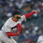 
              Boston Red Sox starting pitcher Eduardo Rodriguez throws against the Seattle Mariners during the first inning of a baseball game, Monday, Sept. 13, 2021, in Seattle. (AP Photo/Ted S. Warren)
            