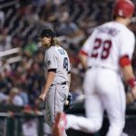 
              Miami Marlins relief pitcher Steven Okert (48) walks back to the mound as Washington Nationals' Lane Thomas (28) is walked home during the fifth inning of a baseball game at Nationals Park, Tuesday, Sept. 14, 2021, in Washington. (AP Photo/Alex Brandon)
            