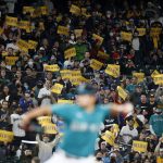 SEATTLE, WASHINGTON - OCTOBER 01: Fans hold "Believe" signs as Marco Gonzales #7 of the Seattle Mariners pitches against the Los Angeles Angels during the first inning at T-Mobile Park on October 01, 2021 in Seattle, Washington. (Photo by Steph Chambers/Getty Images)