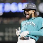 SEATTLE, WASHINGTON - OCTOBER 01: J.P. Crawford #3 of the Seattle Mariners reacts after his single during the third inning against the Los Angeles Angels at T-Mobile Park on October 01, 2021 in Seattle, Washington. (Photo by Steph Chambers/Getty Images)