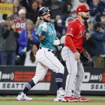 SEATTLE, WASHINGTON - OCTOBER 01: Luis Torrens #22 of the Seattle Mariners reacts after his triple against the Los Angeles Angels during the seventh inning at T-Mobile Park on October 01, 2021 in Seattle, Washington. (Photo by Steph Chambers/Getty Images)