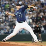 SEATTLE, WASHINGTON - OCTOBER 02: Chris Flexen #77 of the Seattle Mariners pitches against the Los Angeles Angels during the first inning at T-Mobile Park on October 02, 2021 in Seattle, Washington. (Photo by Steph Chambers/Getty Images)