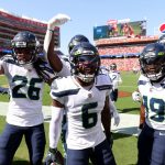 SANTA CLARA, CALIFORNIA - OCTOBER 03: Quandre Diggs #6 of the Seattle Seahawks celebrates an interception with teammates during the first quarter against the San Francisco 49ers at Levi's Stadium on October 03, 2021 in Santa Clara, California. (Photo by Ezra Shaw/Getty Images)