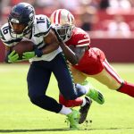 SANTA CLARA, CALIFORNIA - OCTOBER 03: Tyler Lockett #16 of the Seattle Seahawks catches the ball during the first half against the San Francisco 49ers at Levi's Stadium on October 03, 2021 in Santa Clara, California. (Photo by Ezra Shaw/Getty Images)