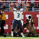 SANTA CLARA, CALIFORNIA - OCTOBER 03: Russell Wilson #3 of the Seattle Seahawks celebrates after running the ball for a touchdown during the third quarter against the San Francisco 49ers at Levi's Stadium on October 03, 2021 in Santa Clara, California. (Photo by Ezra Shaw/Getty Images)