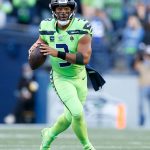 SEATTLE, WASHINGTON - OCTOBER 07: Quarterback Russell Wilson #3 of the Seattle Seahawks passes against the Los Angeles Rams in the first half at Lumen Field on October 07, 2021 in Seattle, Washington. (Photo by Steph Chambers/Getty Images)