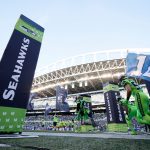 SEATTLE, WASHINGTON - OCTOBER 07: Members of the Seattle Seahawks take the field against the Los Angeles Rams at Lumen Field on October 07, 2021 in Seattle, Washington. (Photo by Steph Chambers/Getty Images)