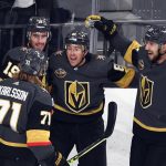 LAS VEGAS, NEVADA - OCTOBER 12: Jonathan Marchessault #81 of the Vegas Golden Knights (3rd from left) celebrates his goal against the Seattle Kraken at 6:36 of the first period of the Kraken's inaugural regular-season game at T-Mobile Arena on October 12, 2021 in Las Vegas, Nevada. (Photo by Sam Morris/Getty Images)