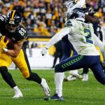 PITTSBURGH, PENNSYLVANIA - OCTOBER 17: Pat Freiermuth #88 of the Pittsburgh Steelers rushes against D.J. Reed #2 of the Seattle Seahawks during the second quarter at Heinz Field on October 17, 2021 in Pittsburgh, Pennsylvania. (Photo by Justin K. Aller/Getty Images)