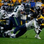 PITTSBURGH, PENNSYLVANIA - OCTOBER 17: Najee Harris #22 of the Pittsburgh Steelers rushes against D.J. Reed #2 of the Seattle Seahawks during the second quarter at Heinz Field on October 17, 2021 in Pittsburgh, Pennsylvania. (Photo by Justin K. Aller/Getty Images)