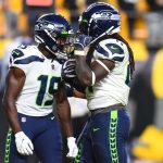 PITTSBURGH, PENNSYLVANIA - OCTOBER 17: Alex Collins #41 of the Seattle Seahawks celebrates his rushing touchdown with Penny Hart #19 during the third quarter against the Pittsburgh Steelers at Heinz Field on October 17, 2021 in Pittsburgh, Pennsylvania. (Photo by Joe Sargent/Getty Images)