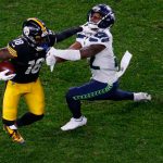 PITTSBURGH, PENNSYLVANIA - OCTOBER 17: Diontae Johnson #18 of the Pittsburgh Steelers rushes against Tre Brown #22 of the Seattle Seahawks during the third quarter at Heinz Field on October 17, 2021 in Pittsburgh, Pennsylvania. (Photo by Justin K. Aller/Getty Images)