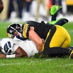 PITTSBURGH, PENNSYLVANIA - OCTOBER 17: Geno Smith #7 of the Seattle Seahawks has the ball stripped by T.J. Watt #90 of the Pittsburgh Steelers in overtime at Heinz Field on October 17, 2021 in Pittsburgh, Pennsylvania. (Photo by Joe Sargent/Getty Images)