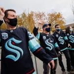 SEATTLE, WASHINGTON - OCTOBER 23:  Fans gather outside prior to the Kraken's inaugural home opening game against the Vancouver Canucks on October 23, 2021 at the Climate Pledge Arena in Seattle, Washington. (Photo by Steph Chambers/Getty Images)