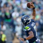 SEATTLE, WASHINGTON - OCTOBER 31: Geno Smith #7 of the Seattle Seahawks reacts after a touchdown during the first quarter against the Jacksonville Jaguars at Lumen Field on October 31, 2021 in Seattle, Washington. (Photo by Steph Chambers/Getty Images)