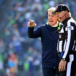 SEATTLE, WASHINGTON - OCTOBER 31: Head coach Pete Carroll of the Seattle Seahawks talks with side judge Rob Vernatchi #75 during the second quarter against the Jacksonville Jaguars at Lumen Field on October 31, 2021 in Seattle, Washington. (Photo by Abbie Parr/Getty Images)