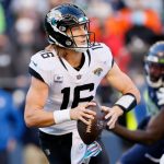 SEATTLE, WASHINGTON - OCTOBER 31: Trevor Lawrence #16 of the Jacksonville Jaguars looks to throw the ball during the fourth quarter against the Seattle Seahawks at Lumen Field on October 31, 2021 in Seattle, Washington. (Photo by Steph Chambers/Getty Images)