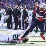
              New England Patriots running back Brandon Bolden (25) tries to break free from New York Jets safety Ashtyn Davis (21) during the first half of an NFL football game, Sunday, Oct. 24, 2021, in Foxborough, Mass. (AP Photo/Steven Senne)
            