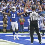 
              Indianapolis Colts wide receiver Michael Pittman (11) celebrates a touchdown against the Tennessee Titans in the first half of an NFL football game in Indianapolis, Sunday, Oct. 31, 2021. (AP Photo/Darron Cummings)
            