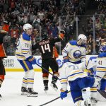 
              Buffalo Sabres players react as Anaheim Ducks' Adam Henrique, center, celebrates his goal during the second period of an NHL hockey game Thursday, Oct. 28, 2021, in Anaheim, Calif. (AP Photo/Jae C. Hong)
            