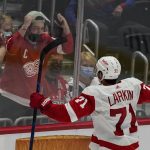 
              Detroit Red Wings center Dylan Larkin celebrates his game-winning goal in overtime of an NHL hockey game against the Washington Capitals, Wednesday, Oct. 27, 2021, in Washington. The Red Wings won 3-2. (AP Photo/Alex Brandon)
            