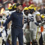 
              Michigan coach Jim Harbaugh yells to officials during a timeout in the first half of an NCAA college football game against Nebraska on Saturday, Oct. 9, 2021, in Lincoln, Neb. (AP Photo/Rebecca S. Gratz)
            