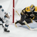 
              San Jose Sharks' Jasper Weatherby (26) tries to get a shot off against Boston Bruins' Linus Ullmark (35) during the third period of an NHL hockey game, Sunday, Oct. 24, 2021, in Boston. (AP Photo/Michael Dwyer)
            