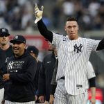 
              New York Yankees' Aaron Judge, right, gestures to fans after a baseball game against the Tampa Bay Rays Sunday, Oct. 3, 2021, in New York. The Yankees won 1-0. (AP Photo/Frank Franklin II)
            