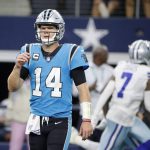 
              Carolina Panthers quarterback Sam Darnold walks to the sideline as Dallas Cowboys' Trevon Diggs (7) celebrates intercepting Darnold's pass in the second half of an NFL football game in Arlington, Texas, Sunday, Oct. 3, 2021. (AP Photo/Michael Ainsworth)
            