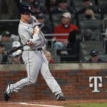 
              Houston Astros' Zack Greinke hits a single during the second inning in Game 4 of baseball's World Series between the Houston Astros and the Atlanta Braves Saturday, Oct. 30, 2021, in Atlanta. (AP Photo/David J. Phillip)
            