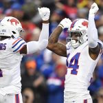 
              Buffalo Bills wide receiver Stefon Diggs (14) celebrates with Emmanuel Sanders (1) after his touchdown during the second half of an NFL football game against the Miami Dolphins, Sunday, Oct. 31, 2021, in Orchard Park, N.Y. (AP Photo/Adrian Kraus)
            