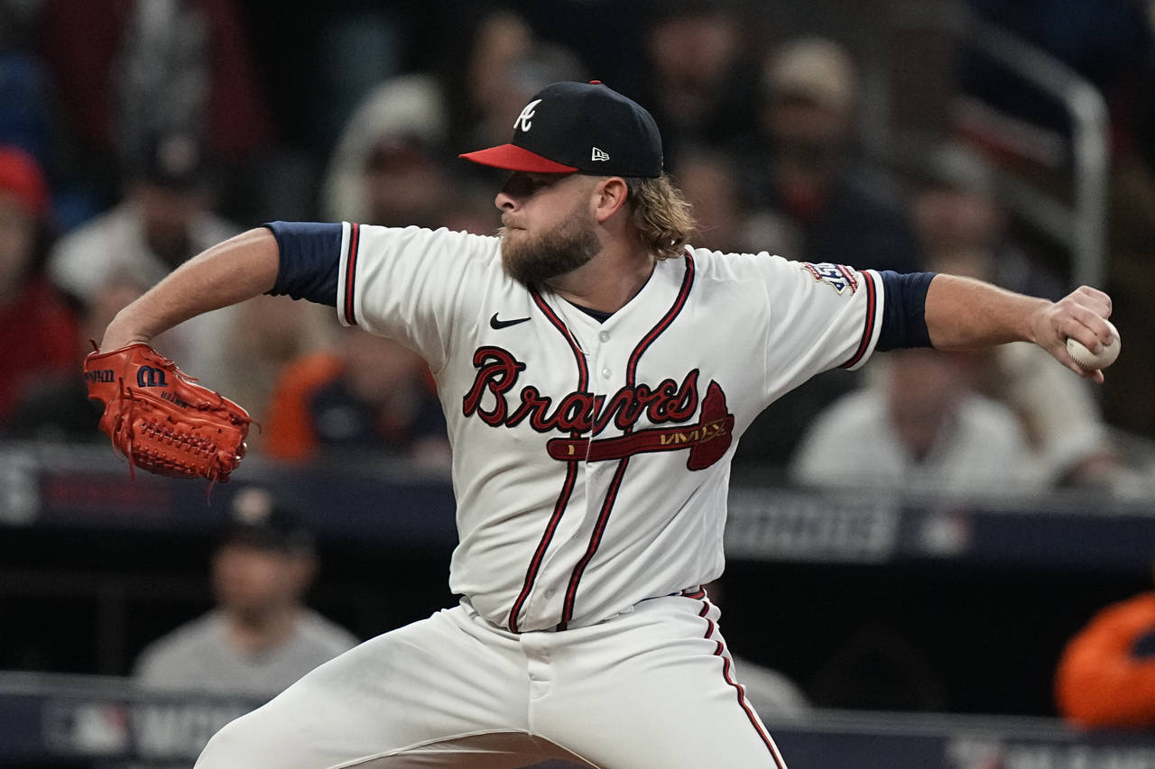 Atlanta Braves relief pitcher A.J. Minter throws during the fourth inning in Game 5 of baseball's W...