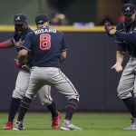 
              Atlanta Braves right fielder Jorge Soler, from left, left fielder Eddie Rosario and and left fielder Adam Duvall celebrate their win against the Milwaukee Brewers in Game 2 of baseball's National League Divisional Series Saturday, Oct. 9, 2021, in Milwaukee.(AP Photo/Aaron Gash)
            