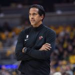 
              Miami Heat coach Erik Spoelstra watches the team play the Indiana Pacers during the first half of an NBA basketball game in Indianapolis, Saturday, Oct. 23, 2021. (AP Photo/Doug McSchooler)
            