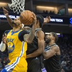 
              Golden State Warriors guard Gary Payton II (0) drives to the basket against the Sacramento Kings during the first quarter of an NBA basketball game in Sacramento, Calif., Sunday, Oct. 24, 2021. (AP Photo/Randall Benton)
            
