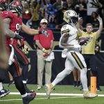 
              New Orleans Saints running back Alvin Kamara walks in a touchdown in the second half of an NFL football game against the Tampa Bay Buccaneers in New Orleans, Sunday, Oct. 31, 2021. (AP Photo/Butch Dill)
            