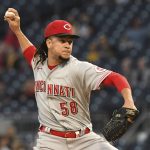 
              Cincinnati Reds starter Luis Castillo (58) throws a first-inning pitch against the Pittsburgh Pirates during a baseball game in Pittsburgh, Friday, Oct. 1, 2021. (AP Photo/Philip G. Pavely)
            