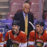 
              Florida Panthers head coach Joel Quenneville looks on from the bench during the first period of an NHL hockey game against the Colorado Avalanche, Tuesday, Oct. 21, 2021, in Sunrise, Fla. (AP Photo/Jim Rassol)
            