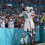 
              Miami Dolphins tight end Mike Gesicki (88), celebrates scoring a touchdown with teammate Miami Dolphins wide receiver Albert Wilson (2), during the second half of an NFL football game against the Indianapolis Colts, Sunday, Oct. 3, 2021, in Miami Gardens, Fla. (AP Photo/Lynne Sladky)
            