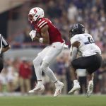 
              Nebraska's Samori Toure (3) catches a pass while under pressure from Northwestern's Coco Azema (0) during the first half of an NCAA college football game, Saturday, Oct. 2, 2021, at Memorial Stadium in Lincoln, Neb. (AP Photo/Rebecca S. Gratz)
            